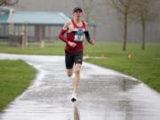 Jared Carson, of Portland, won the men’s portion of the Vancouver Lake Half Marathon, sponsored by the Clark County Running Club, Sunday morning, Feb. 25, 2018 at Vancouver Lake Regional Park. He had an official winning time of 1:07.42. Photo by Randy L.