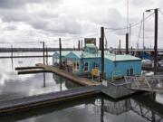 The Puffin Cafe in the Port of Camas-Washougal looks like a house on the water and the restaurant takes advantage of its location with an oceanic theme, including a big ship wheel and other nautical decor.