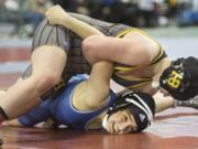 Hudson's Bay's Allison Blaine, above, controls Curtis' Selena Garza during their 135 lb. quarterfinal match in the Girls State Wrestling Championship Friday, Feb. 16, 2018, in Tacoma, Wash. Blaine advanced to the semi-finals.