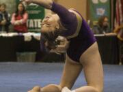 Columbia River's Sarah Ellis competes in the Floor exercise during the 2A/3A State Gymnastics Finals Friday, Feb. 16, 2018, at the Tacoma Dome in Tacoma, Wash. Ellis received a score of 9.475 for her routine.