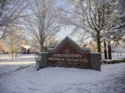 Discovery Middle School is seen in the snow as winter weather closes Vancouver area schools Wednesday morning, Feb. 21, 2018.