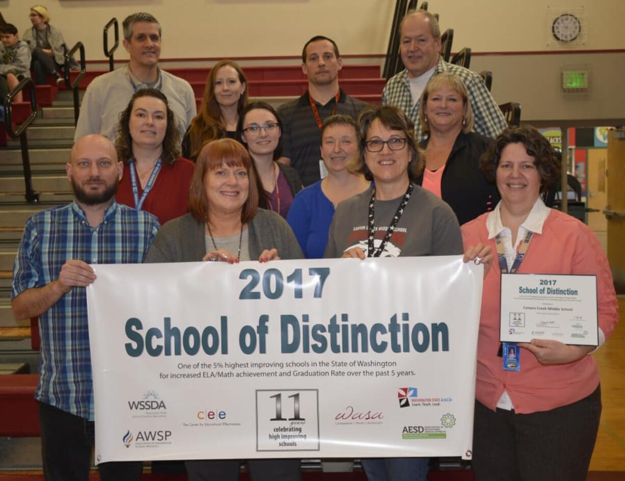 Washougal: Canyon Creek Middle School staffers celebrating at an assembly where the Washougal school was named a 2017 Washington State School of Distinction, the only middle school in the county to earn that honor.