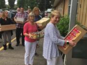 Esther Short: Windermere Realty Trust employees during a service day in Vancouver. The company’s charitable foundation donated more than $405,000 to nonprofits supporting low-income families, including $139,480 that went to organizations in Southwest Washington.