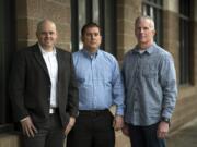 Detective Zachary Ripp, from left, Detective Brian Billingsley and Sgt. Jack Anderson comprise the Vancouver Police Department’s revived property crime unit. They are standing outside the Vancouver Police Department’s West Precinct.