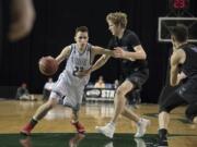 Union’s Ethan Smith (23) drives to the hoop in the third quarter at the Tacoma Dome on Wednesday afternoon, Feb. 28, 2018.