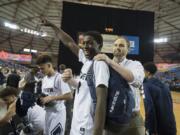 Skyview’s Samaad Hector (3) celebrates after making the game-winning basket over Glacier Peak on Wednesday.