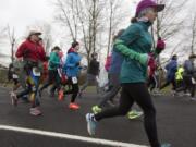 Racers take off from the starting line for the Vancouver Lake Half Marathon in 2017.