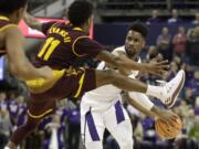 Arizona State guard Shannon Evans II (11) tries to block a pass by Washington guard Jaylen Nowell, right, in the first half of an NCAA college basketball game, Thursday, Feb. 1, 2018, in Seattle. (AP Photo/Ted S.