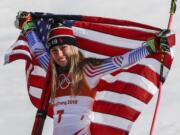 Mikaela Shiffrin, of the United States, celebrate her gold medal during the venue ceremony at the Women's Giant Slalom at the 2018 Winter Olympics in Pyeongchang, South Korea, Thursday, Feb. 15, 2018.