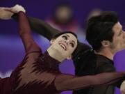 Tessa Virtue and Scott Moir of Canada perform during the ice dance, free dance figure skating final in the Gangneung Ice Arena at the 2018 Winter Olympics in Gangneung, South Korea, Tuesday, Feb. 20, 2018.