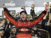 Austin Dillon celebrates in Victory Lane after winning the NASCAR Daytona 500 Cup series auto race at Daytona International Speedway in Daytona Beach, Fla., Sunday, Feb. 18, 2018.