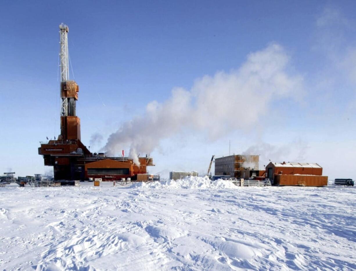 In this undated file photo, drilling operations at the Doyon Rig 19 at the Conoco-Phillips Carbon location in the National Petroleum Reserve, Alaska, are shown. Five environmental groups sued the federal government Friday, claiming the Interior Department conducted a petroleum lease sale in northern Alaska without proper environmental review.