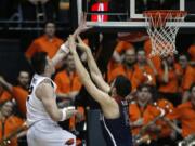 Oregon State’s Drew Eubanks (12) shoots over Arizona’s Dusan Ristic in the first half of an NCAA college basketball game in Corvallis, Ore., Thursday, Feb. 22, 2018. (AP Photo/Timothy J.