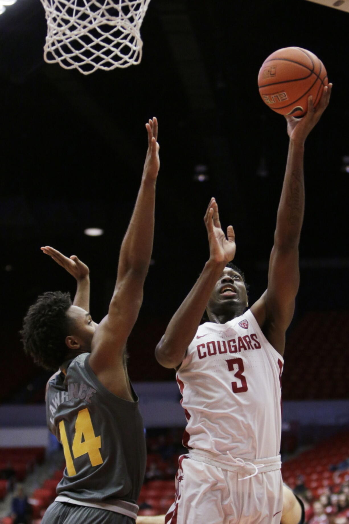 Washington State forward Robert Franks (3) shoots over Arizona State forward Kimani Lawrence (14) during the first half of an NCAA college basketball game in Pullman, Wash., Sunday, Feb. 4, 2018.