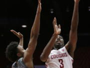 Washington State forward Robert Franks (3) shoots over Arizona State forward Kimani Lawrence (14) during the first half of an NCAA college basketball game in Pullman, Wash., Sunday, Feb. 4, 2018.