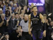 Washington’s Dominic Green reacts after sinking a 3-point basket during the second half against Arizona in an NCAA college basketball game Saturday, Feb. 3, 2018, in Seattle. Washington won 78-75 with Green later hitting the tie-breaking shot in the final seconds.