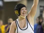 Hudson's Bay's Allison Blaine celebrates after defeating Sequim's Kiara Pierson in their 135-pound championship match at the Girls State Wrestling Tournament Saturday, Feb. 17, 2018, at the Tacoma Dome in Tacoma, Wash. Blaine won the match 4-2.