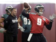 Philadelphia Eagles quarterback Nick Foles (9) throws during a practice for the NFL Super Bowl 52 football game Thursday, Feb. 1, 2018, in Minneapolis. Philadelphia is scheduled to face the New England Patriots Sunday.