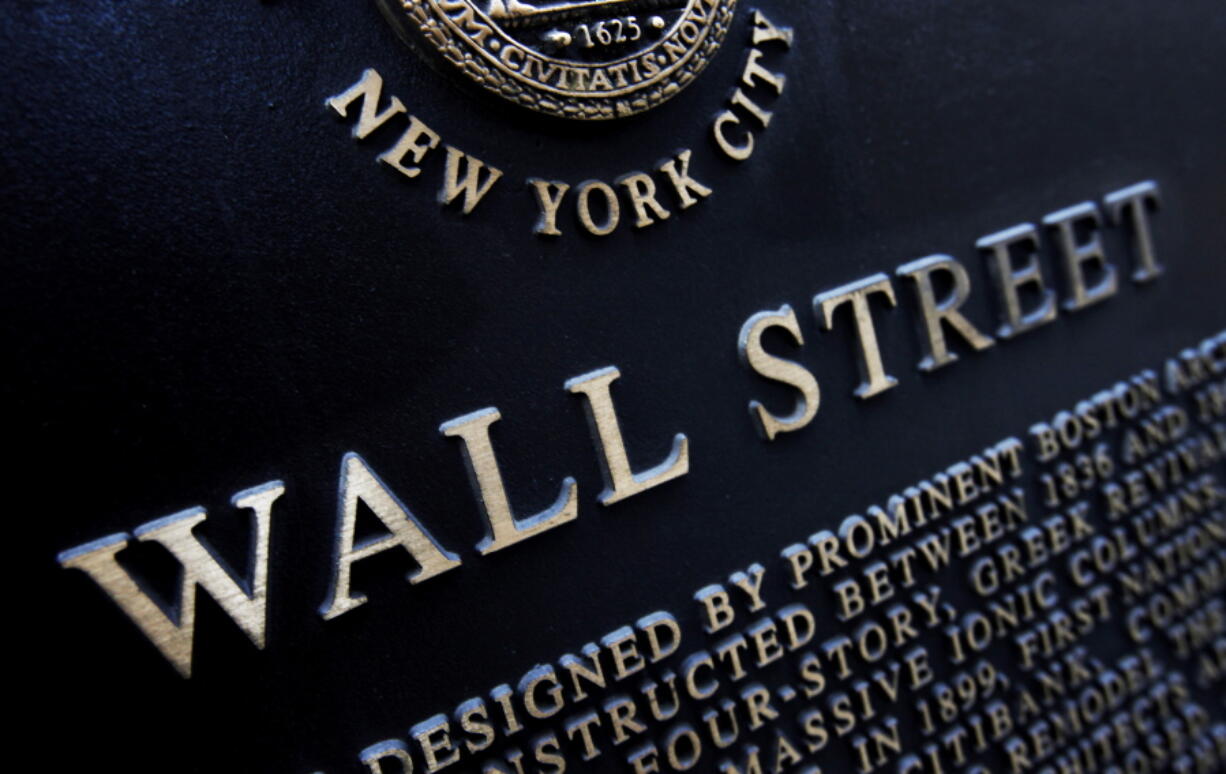 FILE - This Jan. 4, 2010, file photo shows an historic marker on Wall Street in New York. The U.S. stock market opens at 9:30 a.m. EST on Tuesday, Feb. 27, 2018.