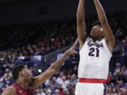 Gonzaga forward Rui Hachimura (21) shoots over Loyola Marymount forward Zafir Williams (1) during the first half of an NCAA college basketball game in Spokane, Wash., Thursday, Feb. 15, 2018.