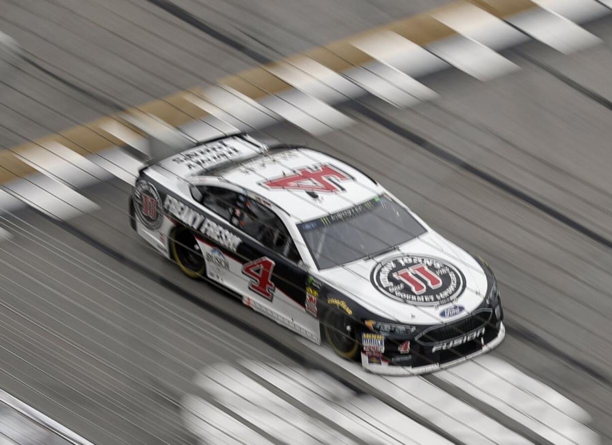 Kevin Harvick (4) crosses the start finish line during the NASCAR Cup Series auto race at Atlanta Motor Speedway in Hampton, Ga., on Sunday, Feb. 25, 2018.