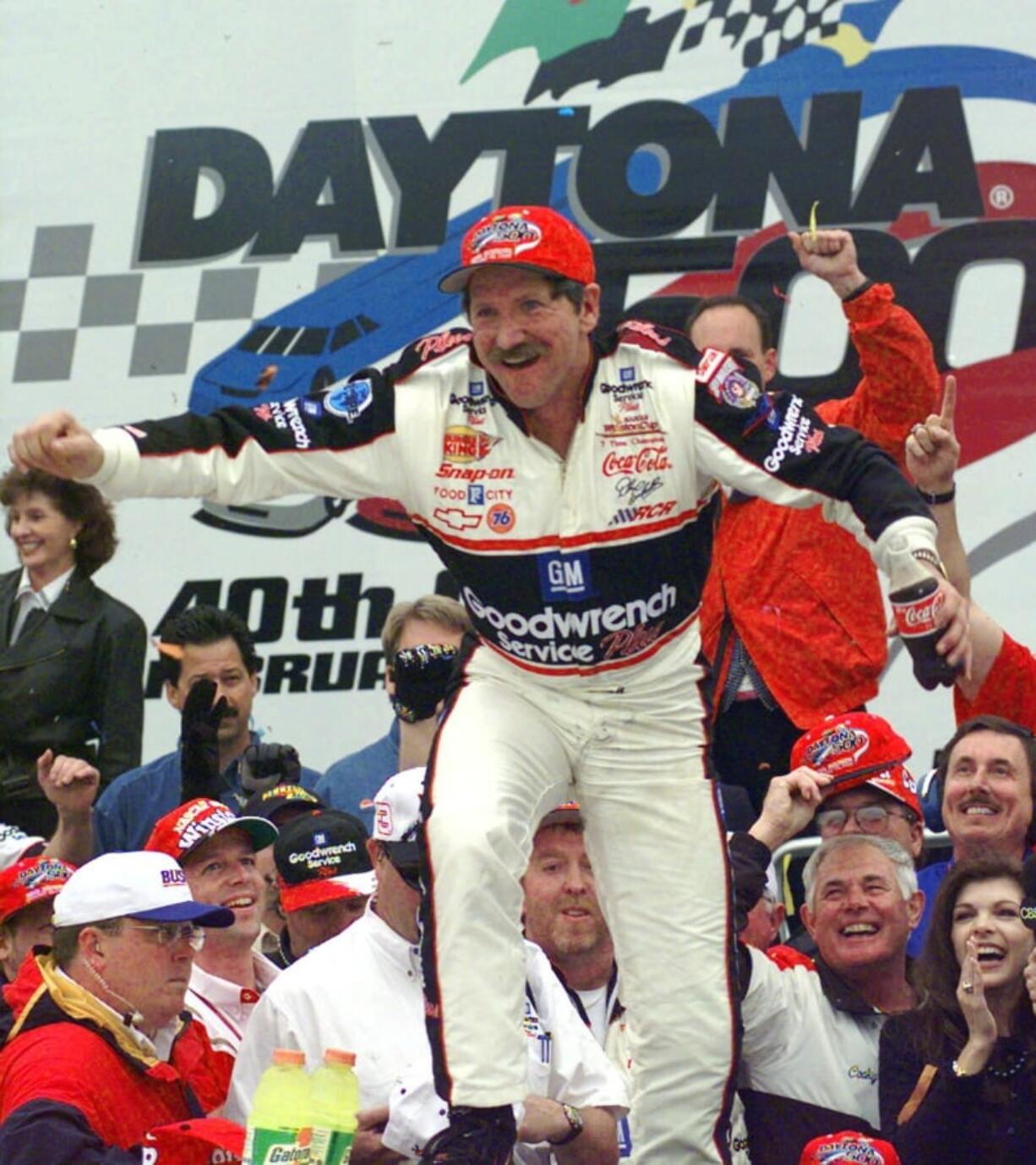 Dale Earnhardt smiles in Victory Lane after winning the NASCAR Daytona 500 on Feb. 15, 1998, at Daytona International Speedway in Daytona Beach, Fla.