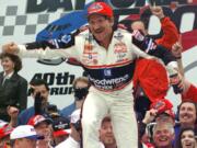 Dale Earnhardt smiles in Victory Lane after winning the NASCAR Daytona 500 on Feb. 15, 1998, at Daytona International Speedway in Daytona Beach, Fla.