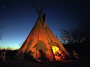 Members of the Native American Church prepare Feb. 17, 1996, for a prayer meeting in Mirando City, Texas. The Native American Church of North America has settled a lawsuit in late Jan. 2018, against the Transportation Security Administration, leading to more training for agents on how to screen religious items.