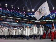 Athletes from Russia wave during the opening ceremony of the 2018 Winter Olympics in Pyeongchang, South Korea. Russia says the IOC has reinstated the country to the Olympic movement despite two failed doping tests by its athletes at the Pyeongchang Winter Olympics. In quotes carried by the TASS news agency, Russian Olympic Committee President Alexander Zhukov said a letter had been received earlier Wednesday, Feb. 28, 2018 from the IOC announcing the nation’s reinstatement. (AP Photo/Jae C.