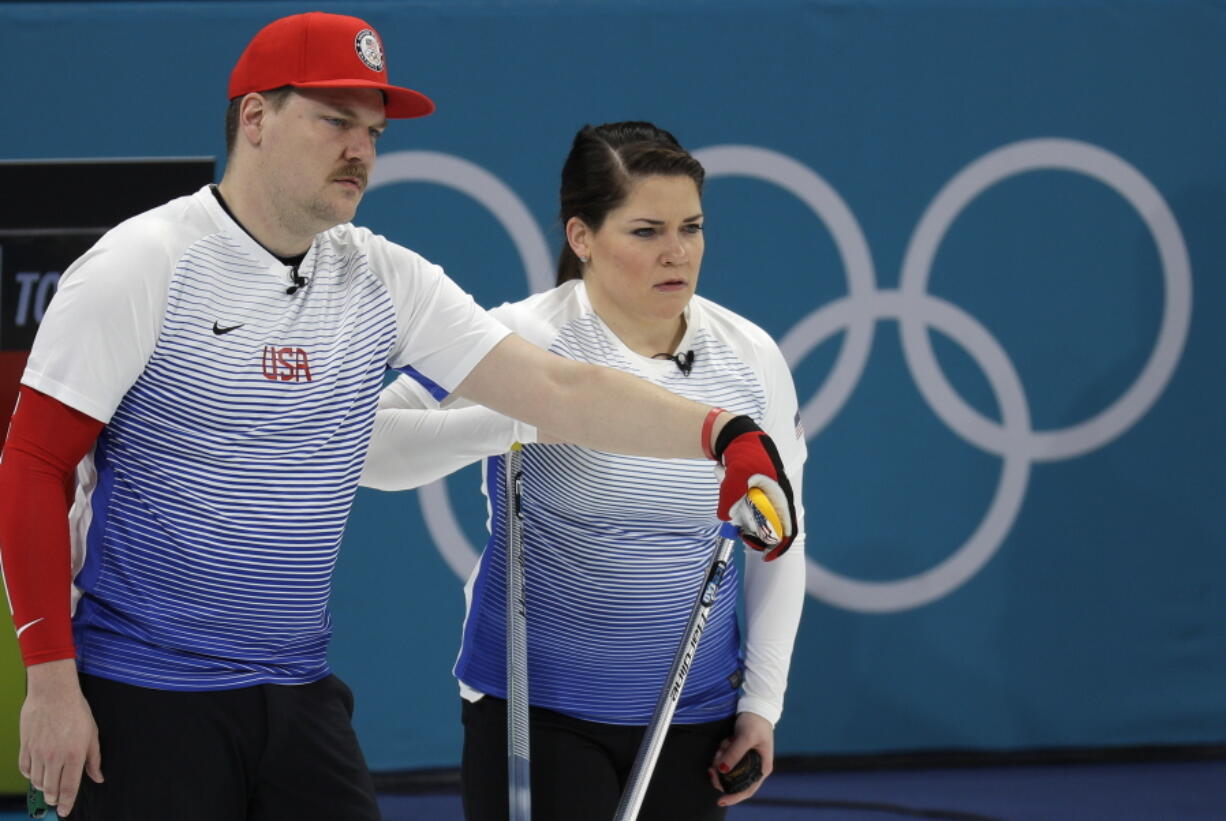 United States’ siblings Matt and Becca Hamilton for their turn during the mixed doubles curling match against Finland at the 2018 Winter Olympics in Gangneung, South Korea, Sunday, Feb. 11, 2018.