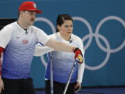 United States’ siblings Matt and Becca Hamilton for their turn during the mixed doubles curling match against Finland at the 2018 Winter Olympics in Gangneung, South Korea, Sunday, Feb. 11, 2018.