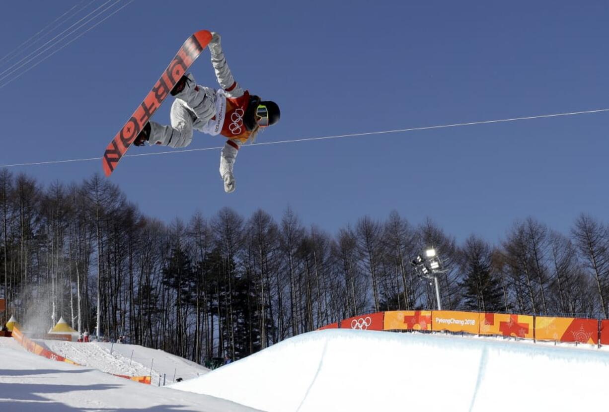 Chloe Kim, of the United States, jumps during the women’s halfpipe finals at Phoenix Snow Park at the 2018 Winter Olympics in Pyeongchang, South Korea, Tuesday, Feb. 13, 2018.