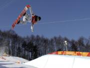 Chloe Kim, of the United States, jumps during the women’s halfpipe finals at Phoenix Snow Park at the 2018 Winter Olympics in Pyeongchang, South Korea, Tuesday, Feb. 13, 2018.