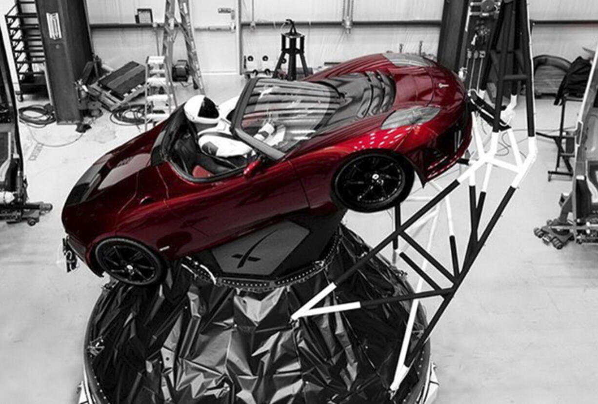 A mannequin “Starman” sits at the wheel of a Tesla Roadster in this photo posted on the Instagram account of Elon Musk, head of auto company Tesla and founder of the private space company SpaceX. The car will be on board when SpaceX launches its new rocket, the Falcon Heavy, from Kennedy Space Center at Cape Canaveral, Fla., scheduled for Tuesday.