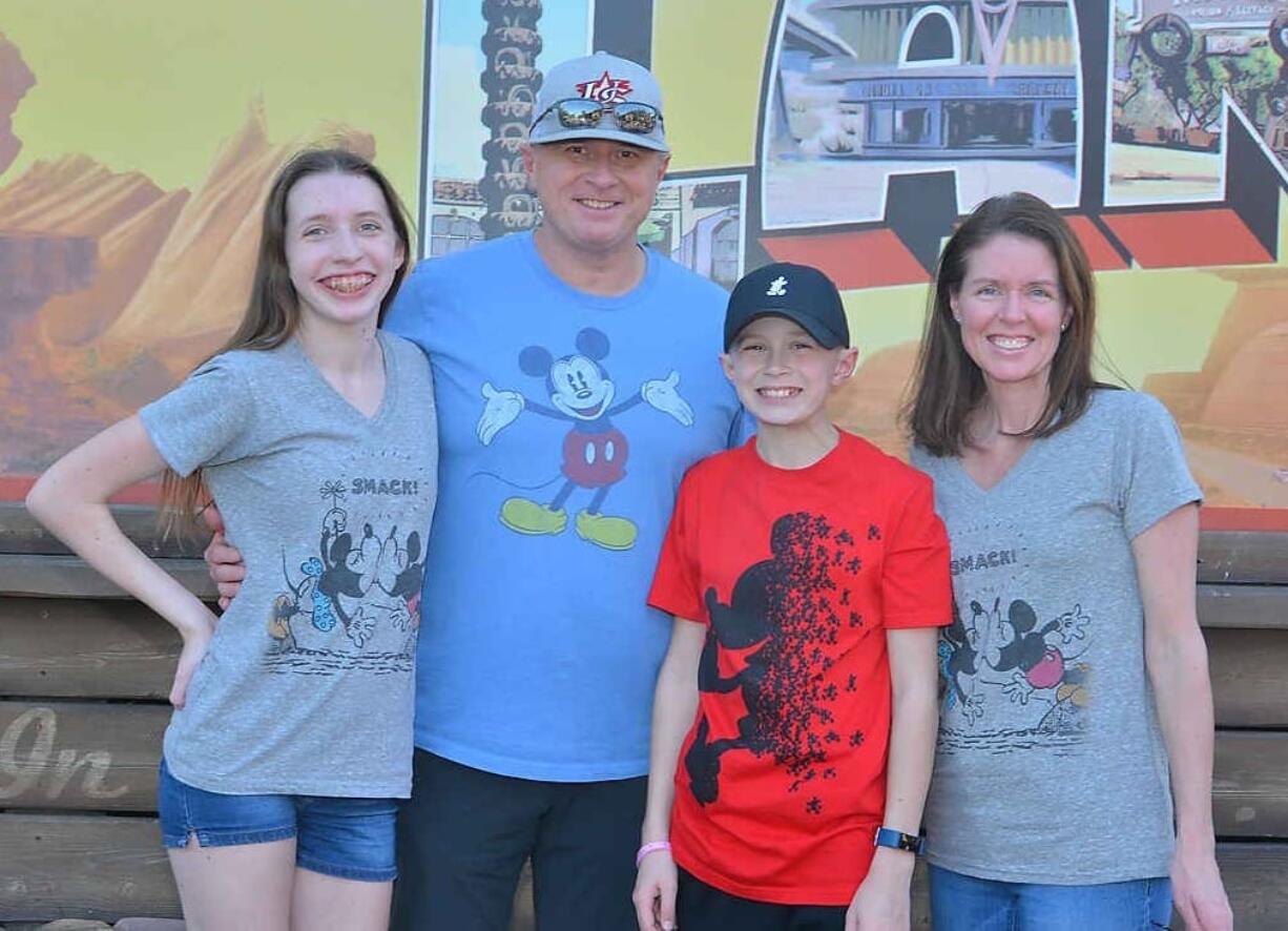 New King's Way Christian baseball coach Gregg Swenson with his family, from left, daughter Megan, son Jacob and wife Diane