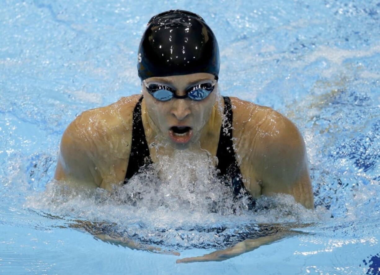 Ariana Kukors competes July 30, 2012, during the Summer Olympics in London. Investigators served a search warrant at 46-year-old Sean Hutchison’s Seattle apartment Tuesday.