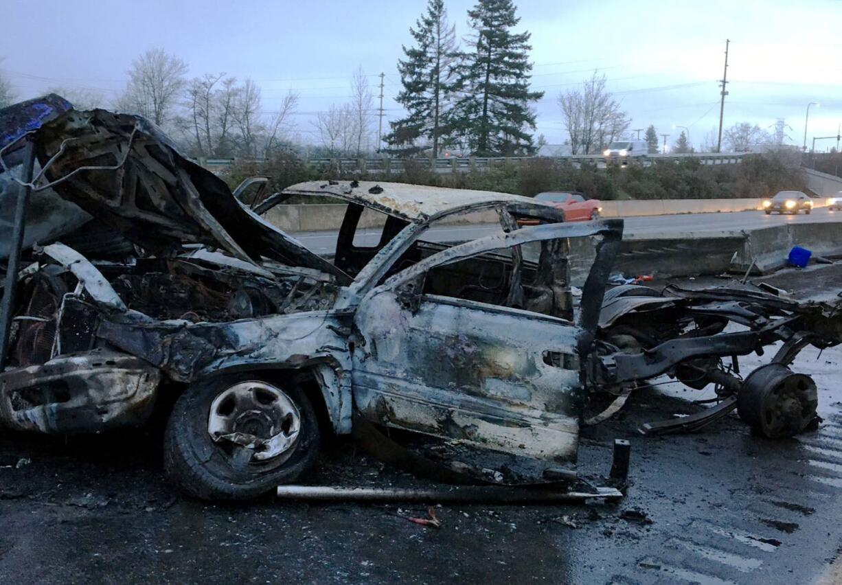 A truck carrying construction materials lost control and hit the jersey barrier between the north and southbound lanes of Interstate 5 south of Chehalis early Tuesday morning. A Vancouver man was injured in the crash.