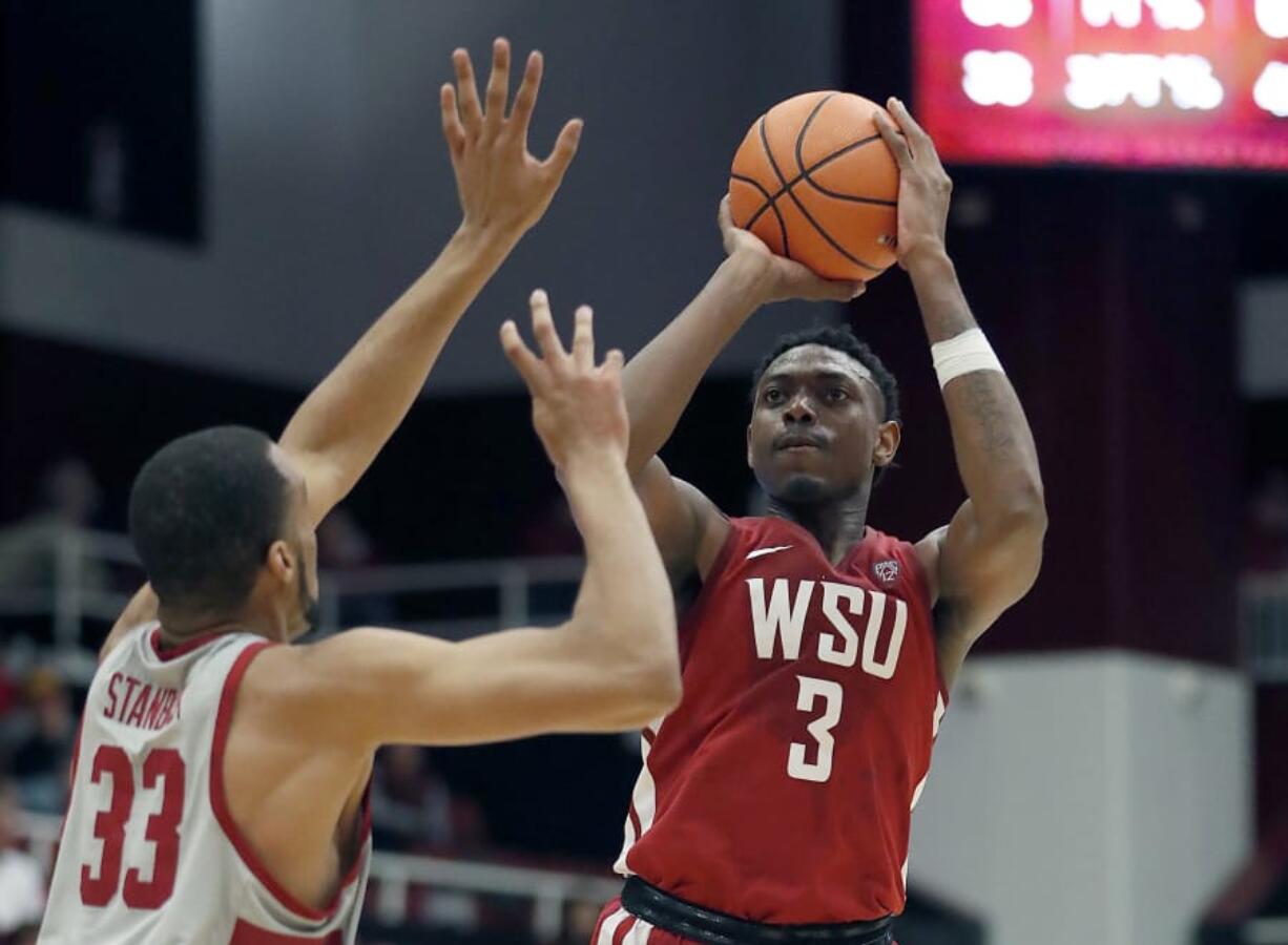 Washington State forward Robert Franks (3) takes a shot over Stanford forward Trevor Stanback (33) during the second half of an NCAA college basketball game Saturday, Feb. 24, 2018, in Stanford, Calif. Stanford won 86-84.