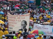 An estimated 380,00 people gather May 23, 2015, as El Salvador celebrates the beatification ceremony and Mass announcing the beatification of Archbishop Oscar Romero. The archbishop was slain at the altar of his Church of the Divine Providence by a right-wing gunman in 1980.