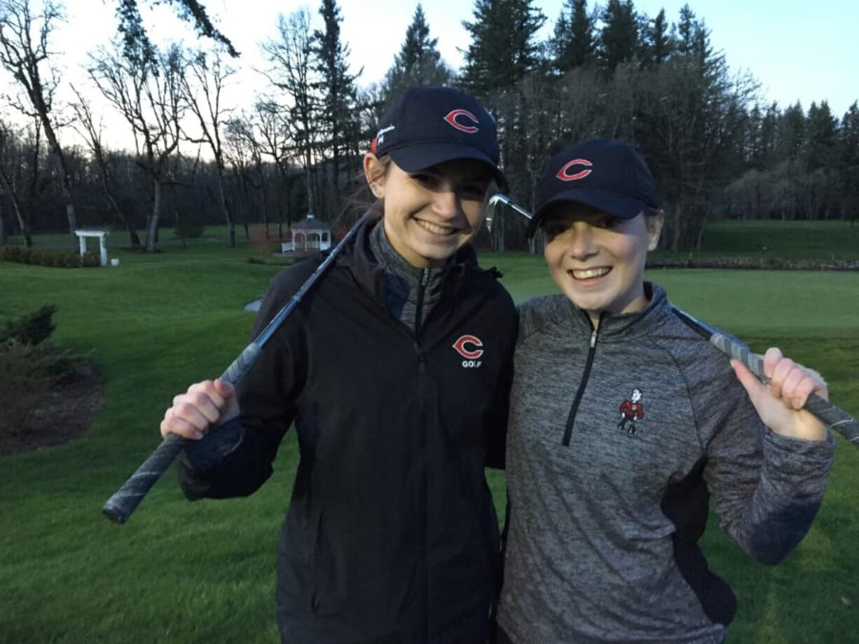 Camas golfers Haley Oster, left, and Emma Cox hope to lead the Papermakers to a high state finish this spring. Oster, a senior, placed ninth in state last year. Cox, a junior, placed third.