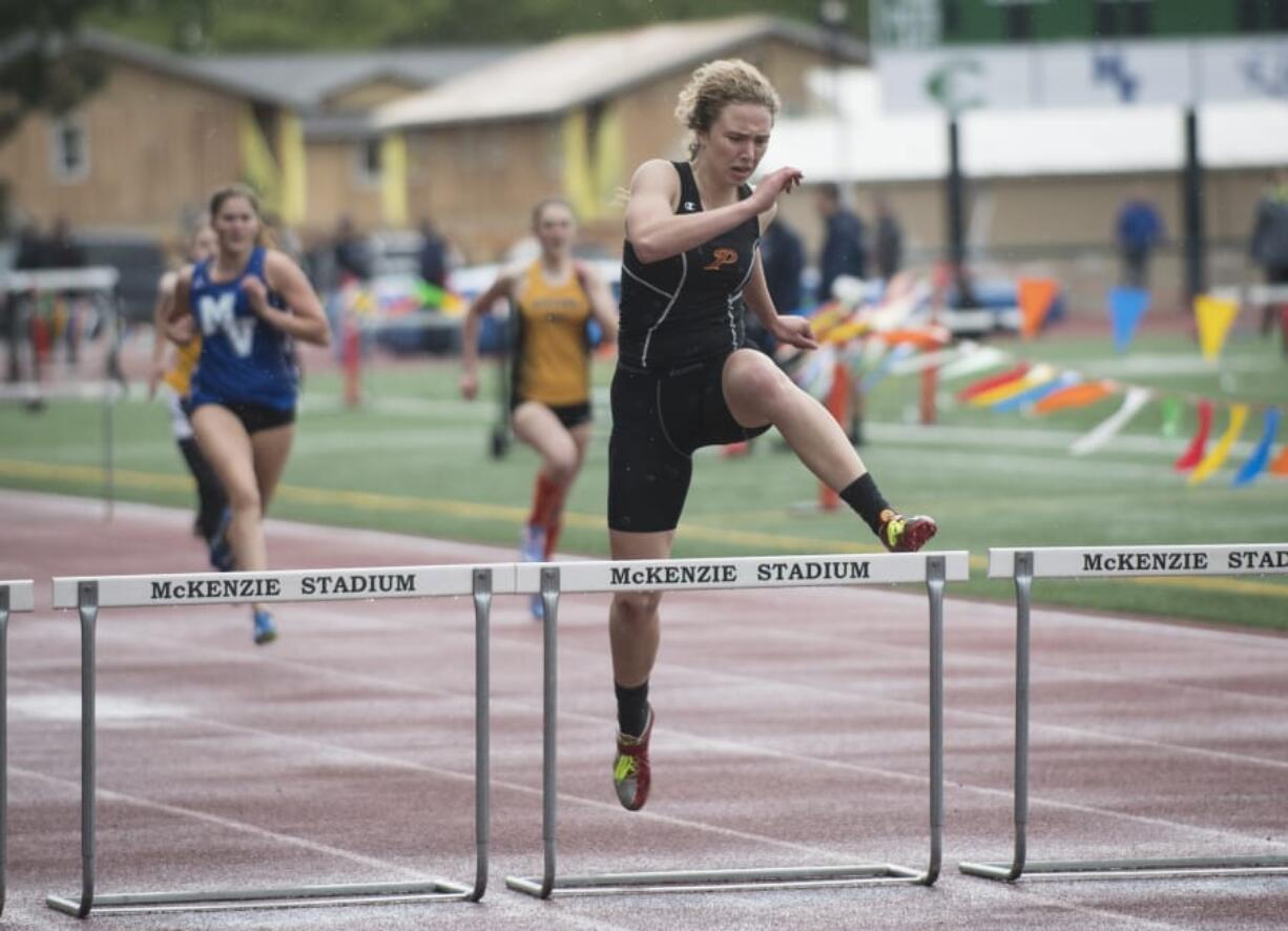 While Valerie Schmidt specializes in the hurdles, the Prairie senior competes in four individual events.