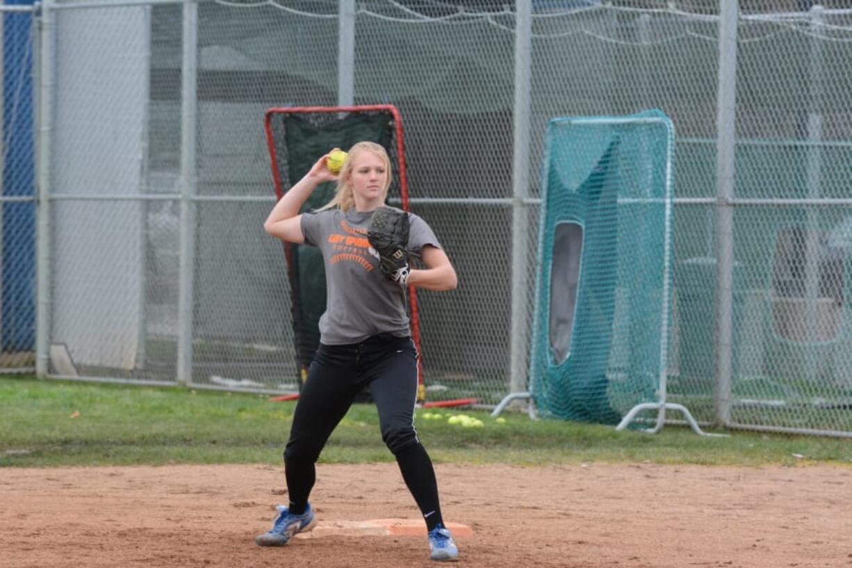 Ridgefield pitcher Kaia Oliver, left, struck out 189 batters last year on pitches called by catcher Emma Jenkins.