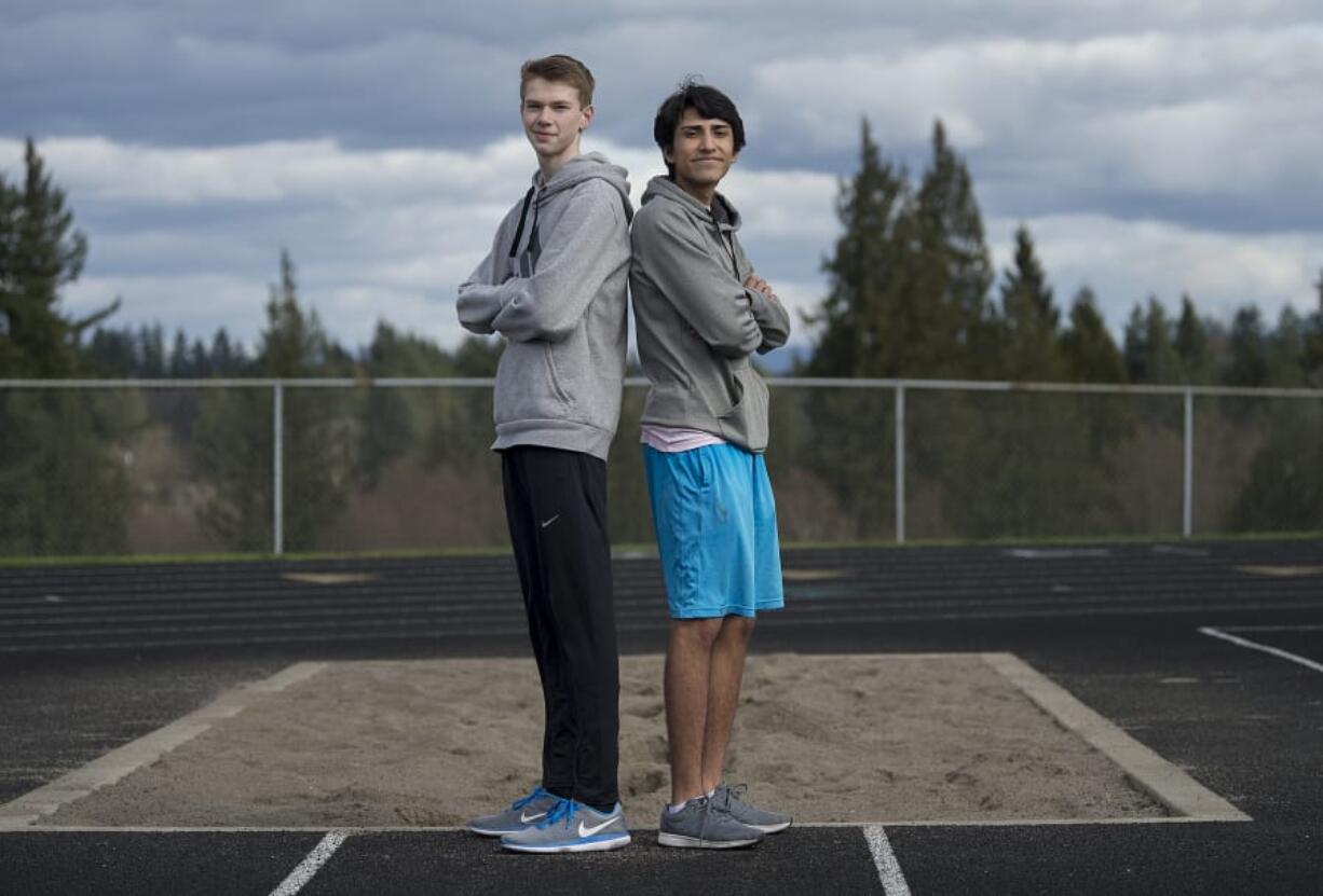 Ridgefield triple jumpers Nick Jenkins, left, and Bryan Tavera are still relatively new to track and field.