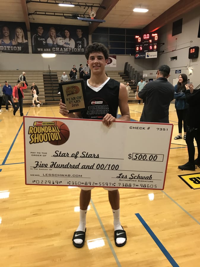 Tre Carlisle of Camas was MVP of the boys game, earning a $500 scholarship. He scored 20 points, to go with eight rebounds and two blocked shots.