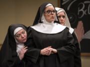 Kimberly Dewey, from left, Laurie Campbell-Leslie and Gayle Beacock react to news of a disaster in the kitchen in “Nunsense.”