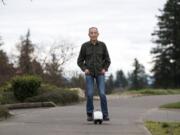 Camas-based inventor Shane Chen said he barely saw any profits from the hoverboard craze he helped start in 2015 with his invention, the Hovertrax. Knockoffs flooded the market and a typo in his patent later foiled attempts to sue. Here he demonstrates his latest invention, the IOTATrax, that he hopes to better protect.