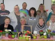 Hazel Dell: The Washington State University Master Food Preservers honored their volunteers at its annual awards and recognition event. Front row, from left: Malia Myers, Judi Seifert, Helen Redmond, Jennifer Kootstra, Elizabeth Dutson and Zena Edwards. Back row, from left: Vicki Ivy, Debra Basquez, Carolyn Heniges, Scotty Parrish, Lori Bryan, Laurie Burgess and Sandra Brown.