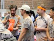 North Image: Competitors in the Clark County Family YMCA’s third annual TENtastic Decathlon participate in one of the day’s events. The decathlon raised $10,000 for the organization.