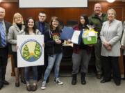 Orchards: The Clark County Council honored four Heritage High School students for work in a contest to design a new logo for the Clark County Parks Advisory Board. From left: Council Chair Marc Boldt, Councilor Jeanne Stewart, first-place winner Heidi Hayden, second-place winner Eli Entwistle, third-place co-winner Jennifer Jones, third-place co-winner Viktoria Kryshtal, Bill Bjerke, parks manager, Councilor Julie Olson and Councilor Eileen Quiring.