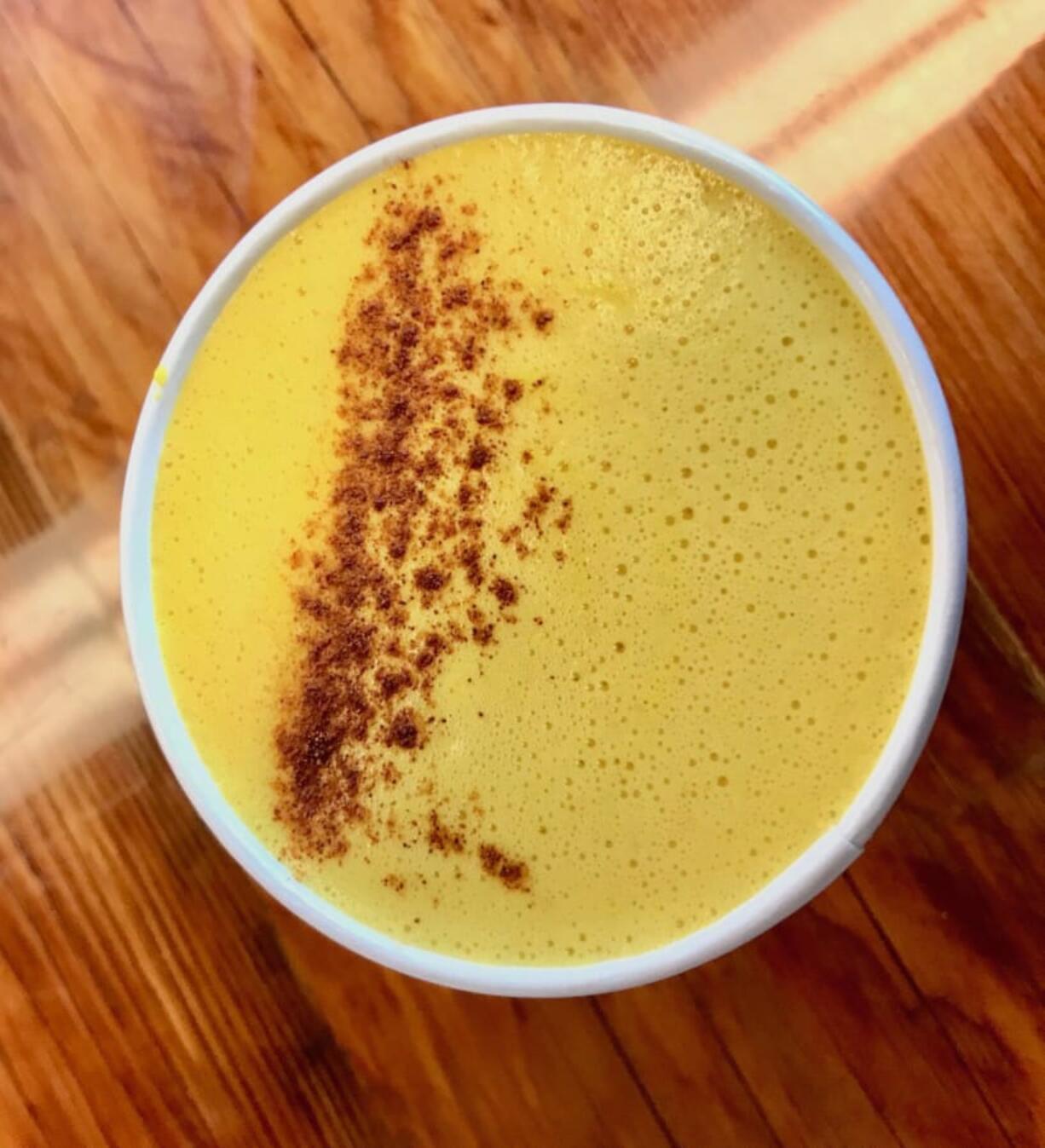 The turmeric latte from Relevant Coffee features creamy coconut and a gingery turmeric flavor that makes for a highly addictive vegan drink.